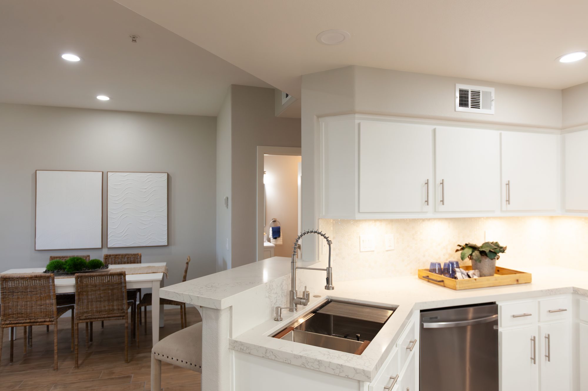 Kitchen with white cabinets and quartz