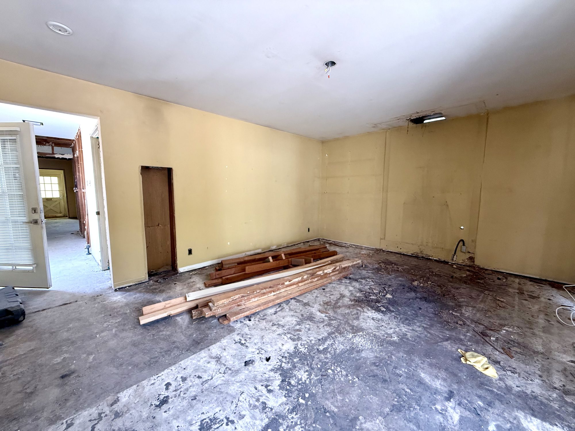 Stripped interior, sub-floor exposed